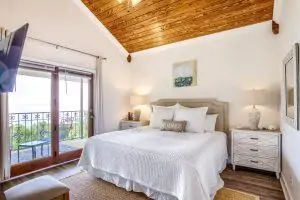 Azalea Suite Bedroom Jubilee Suites in Fairhope, AL